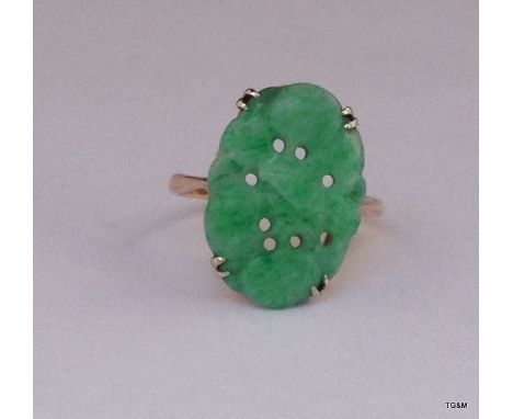 A 9ct gold Jade ring maker J+S size L