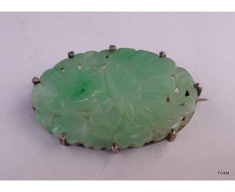 A jade carved brooch