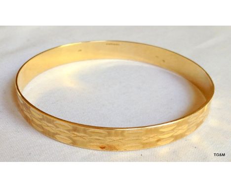 A 14ct gold ladies bangle, 18 grams