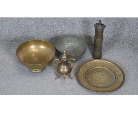 A collection of brass ware. Including a Turkish coffee grinder, a pedestal bowl and an engraved Indian bowl. 