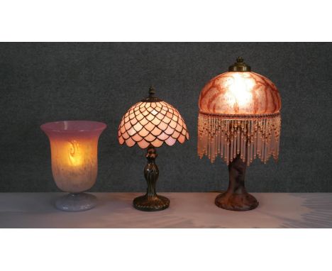 Three table lamps. Including an Art Deco style domed marbled glass beaded fringe lamp, a pink gradient Art Glass vase lamp an