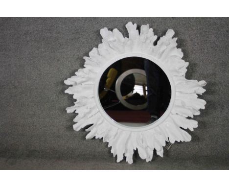 A large organic sculptural sunburst design fibreglass wall mirror. 87cm diameter. 
