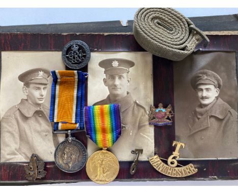 A FIRST WORLD WAR PAIR AND WAR BADGE TO THE MANCHESTER REGIMENT. A Great War Pair comprising War Medal and Victory Medal name
