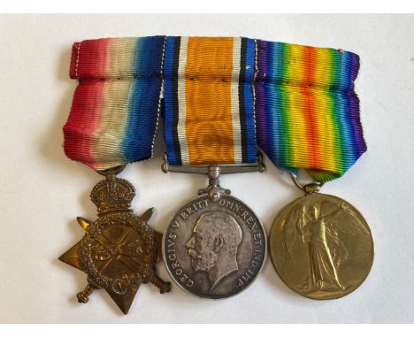 A FIRST WORLD WAR TRIO TO THE GLOUCESTERSHIRE/BEDFORDSHIRE REGIMENT. A Great War Trio comprising 1914-15 Star named to 12. 14
