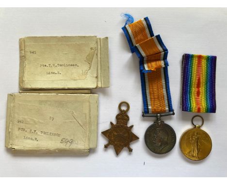 A FIRST WORLD WAR TRIO TO THE LINCOLNSHIRE REGIMENT. A Great War trio comprising 1914-15 Star named to 941 Pte T.W. Tomlinson