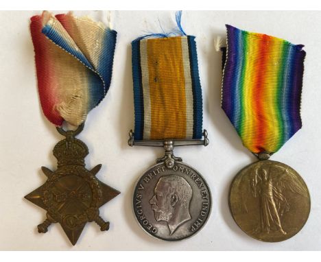 A FIRST WORLD WAR TRIO TO THE ROYAL SCOTS. A Great War Trio comprising 1914-15 Star named to 19580 Pte H. Wade R.Sc Fus. War 