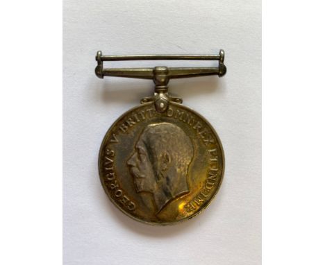 A FIRST WORLD WAR WAR MEDAL TO THE ROYAL NAVAL AIR SERVICE. A War Medal named to W.O. 2 C.W. Raymond R.N.A.S. *CR Light surfa