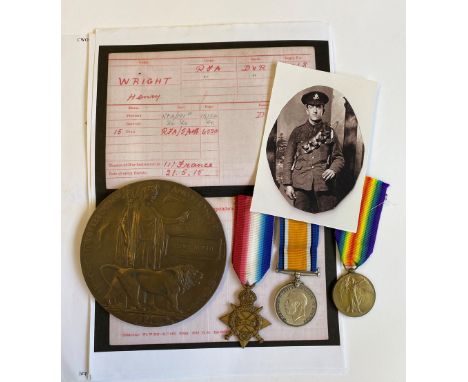 A FIRST WORLD WAR TRIO AND PLAQUE TO THE FIELD ARTILLERY. A Great War Trio comprising 1914-15 Star named to 60068 Dvr H. Wrig