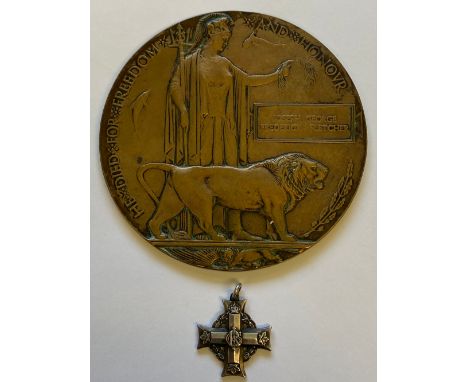 A FIRST WORLD WAR MEMORIAL PLAQUE AND CANADIAN MEMORIAL CROSS. A Memorial Plaque named to Joseph George Frederick Fletcher an