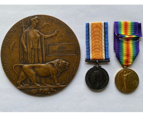 A FIRST WORLD WAR PAIR AND MEMORIAL PLAQUE TO THE MANCHESTER REGIMENT. A Great War Pair comprising War Medal and Victory Meda