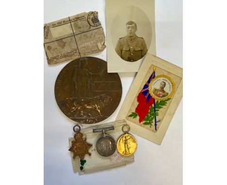 A FIRST WORLD WAR TRIO AND MEMORIAL PLAQUE TO THE EAST LANCS REGIMENT. A Great War Trio comprising 1914-15 Trio named to 1295