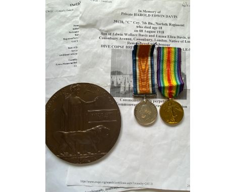 A FIRST WORLD WAR PAIR AND MEMORIAL PLAQUE TO THE NORFOLK REGIMENT. A Great War Pair comprising War Medal and Victory Medal n