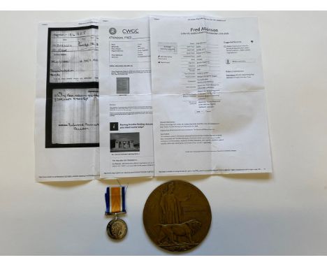 A FIRST WORLD WAR MEMORIAL PLAQUE AND WAR MEDAL TO THE BORDER REGIMENT. A Great War Memorial Plaque and War Medal, the medal 