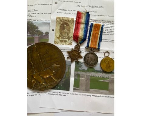 A FIRST WORLD WAR TRIO AND MEMORIAL PLAQUE TO THE ROYAL LANCASTER REGIMENT. A Great War Trio comprising 1914-15 Star named to
