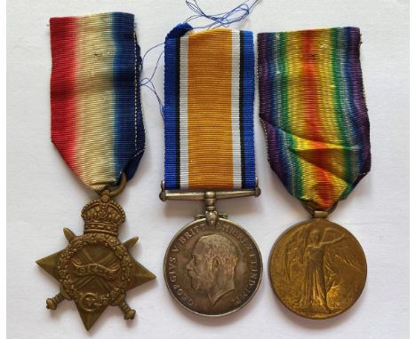 A FIRST WORLD WAR TRIO AND MEMORIAL PLAQUE TO THE COLDSTREAM GUARDS. A Great War Trio comprising 1914-15 Star named to 11789 