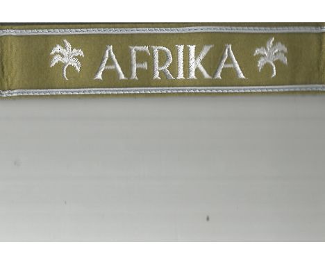 WW2 Africa Corps Cuff title band The Africa Cuff Title, or Africa Cuff Band, was a World War II German military decoration aw