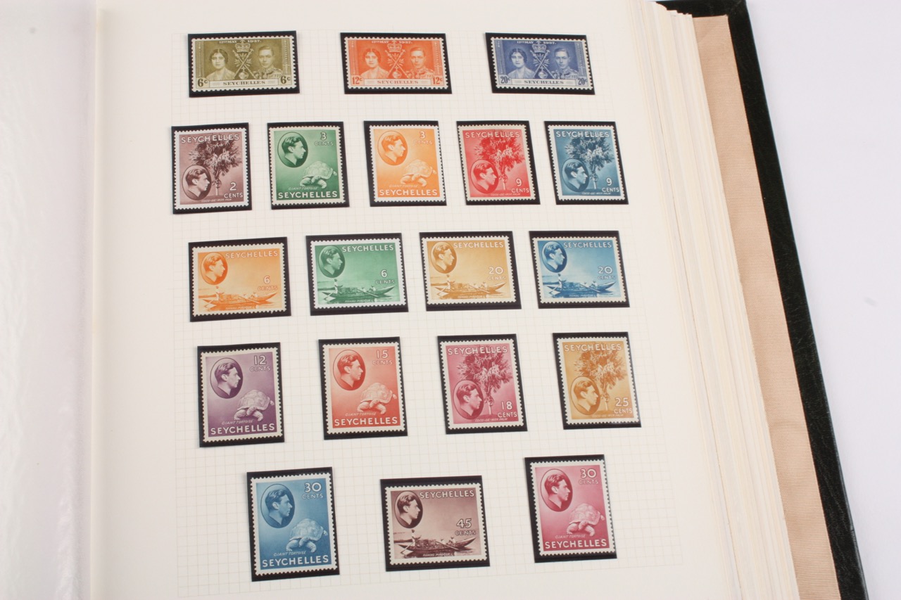 Five albums of 'The King VI Stamp Collection'each stamp in hawid