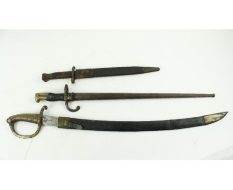 A 19th Century brass hilted French curved short Sword, the blade stamed AA (crowned) A1587, and in original brass mounted lea
