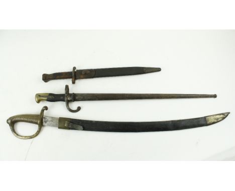 A 19th Century brass hilted French curved short Sword, the blade stamed AA (crowned) A1587, and in original brass mounted lea