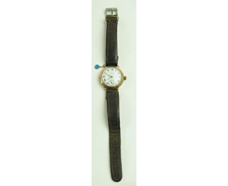 A 1930's Gentleman's&nbsp;Wrist Watch, with gold frame by "Omega" with original leather strap, and enamel dial and Roman nume