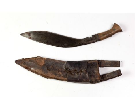 An early 20th Century Kurkha, with shaped blade stamped 1915, with wooden handle and scabbard. (1) 