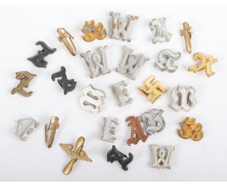25x German WW2 Shoulder Board Ciphers, being white metal and gilt examples. Mostly with prong fittings to the reverse. Some c