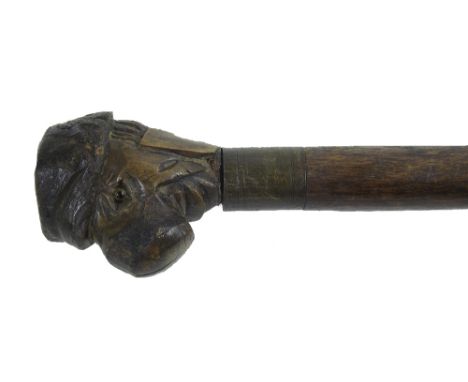 Novelty carved walking stick modelled as a grotesque head, 37.5" long