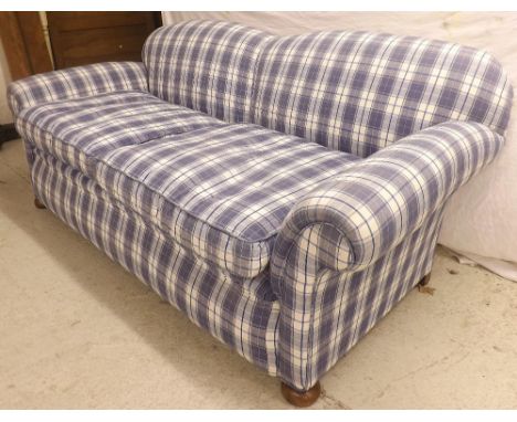 Early 20th century re-upholstered blue check pattern settee, with loose seat cushions upon button feet, 72" wide