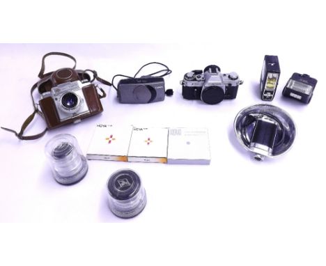 Large collection of photographic equipment to include AGFA Ambi Silette camera within a brown leather case with further lense
