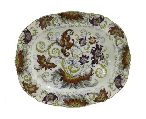 Good antique 'Pandah' ceramic meat platter decorated with scrolled foliage and gilded highlights, 21" long