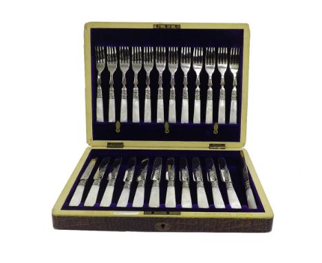 Cased canteen fitted with pearl handled knives and forks for twelve