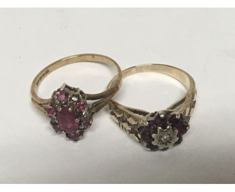 Two 9carat gold rings set with a small diamond and ruby coloured stones. Weight 4.5g