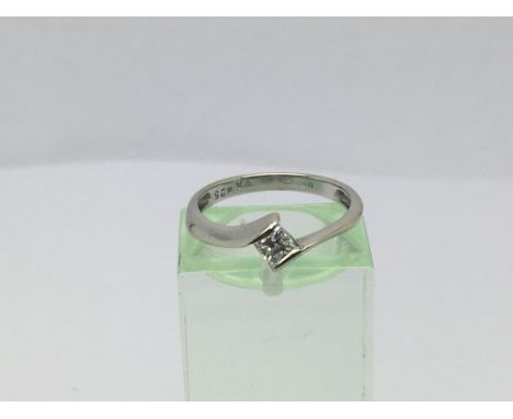 An 18ct white gold ring set with a princess cut solitaire diamond, approx.25ct, approx 1.8g and approx size K-L.