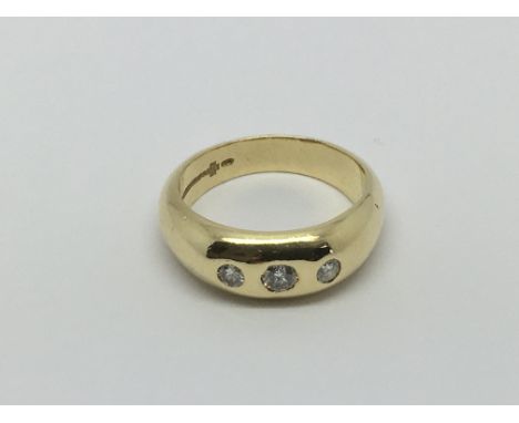 A gents 18ct gold three stone diamond ring, approx .25ct, approx 10g and approx size R.