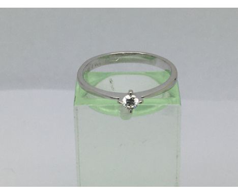 An 18ct white gold diamond solitaire ring, approx.10ct, approx 1.8g and approx size M-N.