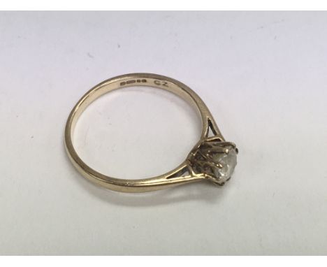 A 9ct gold and CZ solitaire ring. 1.5g