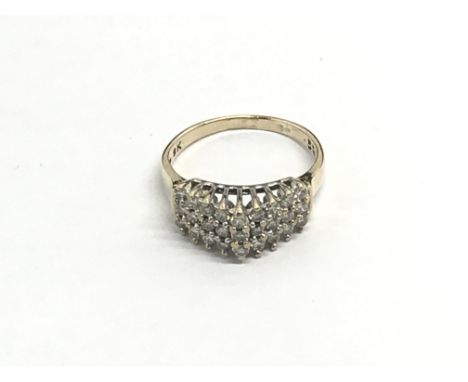 A 9ct gold apex set ring set with rows of diamonds, approx 2.7g and approx size L.