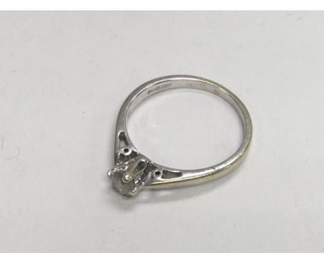 A 9ct white gold diamond solitaire ring 0.25ct. Ring size m.