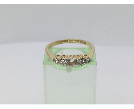 An 18ct gold and platinum diamond ring (one stone missing), approx 2.3g and approx size L-M.