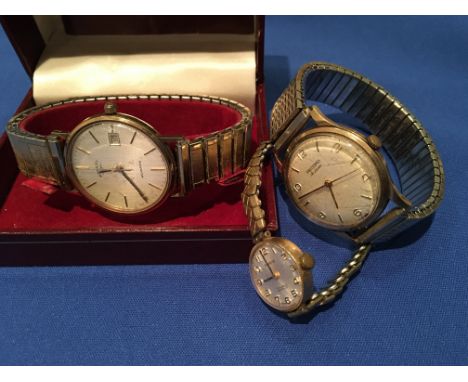 A gents 9ct cased Rotary wristwatch together with a Gents 9ct cased Record de luxe watch and a ladies 9ct cased watch.