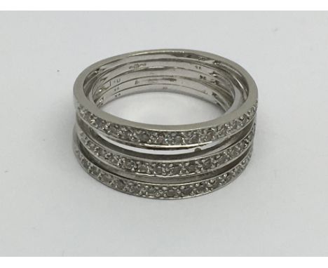 A 9ct white gold ring set five rows of diamonds, approx 1ct, approx 7.8g and approx size R-S.