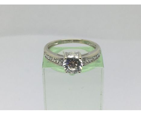 A 9ct white gold CZ dress ring, approx 2.1g and approx size K-L.