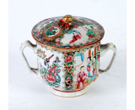 NINETEENTH CENTURY CHINESE CANTON FAMILLE ROSE PORCELAIN TWO HANDLED CUP AND COVER, decorated with four reserves with interio