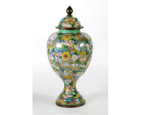 EARLY TWENTIETH CENTURY CHINESE LARGE CLOISONNE VASE AND DOMED COVER,  with millefiori decoration on a scale green ground, th