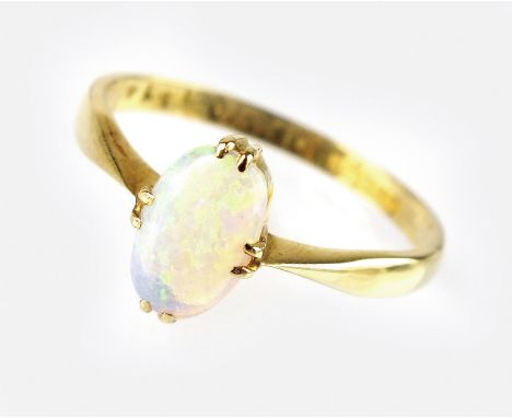 An 18ct gold opal dress ring, designed as a single oval cabochon opal claw set to tapering yellow gold shank, ring size N, we