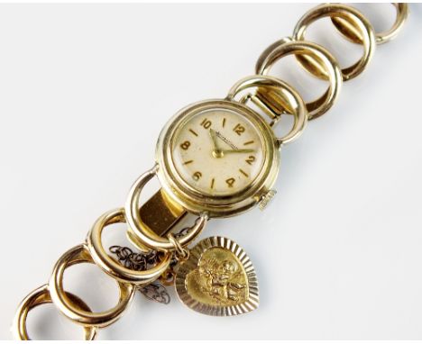 A Lady's 9ct gold Jaeger-Le-Coultre bracelet watch, the circular silvered dial with Arabic numerals and batons, manual wind, 