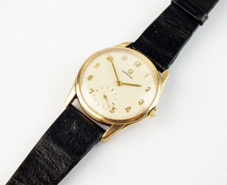 A Gentleman's 9ct gold Omega wristwatch, the white dial with gold Arabic numerals and subsidiary seconds dial, manual wind, e