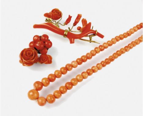 A graduated coral bead necklace, with yellow metal barrel snap, stamped '9ct', 52cm long, together with a stick and carved co