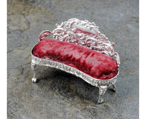 An Edwardian novelty silver pin cushion in the form of a seat, Levi & Salaman, Birmingham 1901, the two seated kidney shaped 