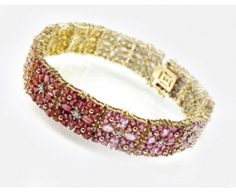 A multicoloured sapphire and diamond bracelet, designed as fourteen panels each set with a central brilliant cut diamond with